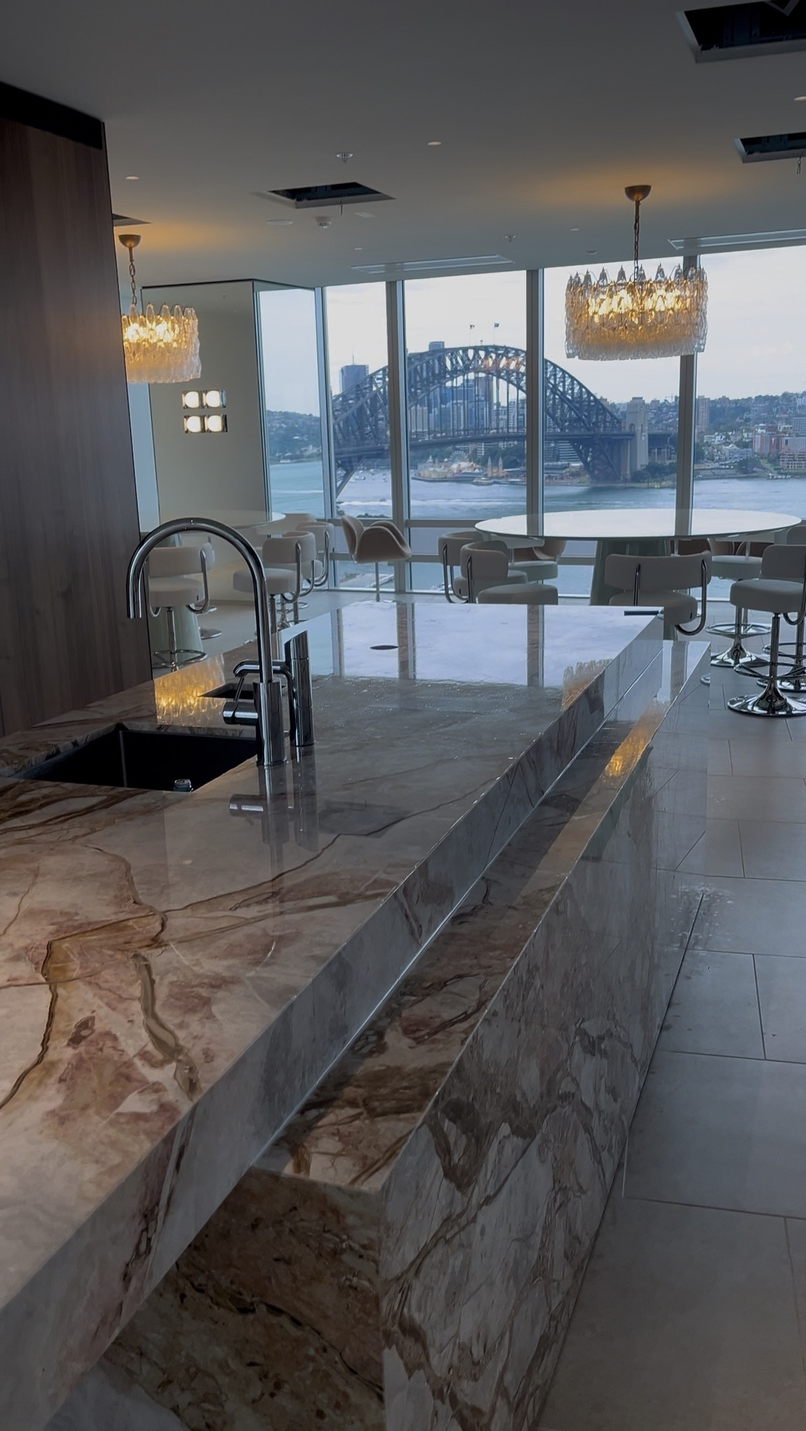 Premium stone benchtop with a view across Sydney Harbour