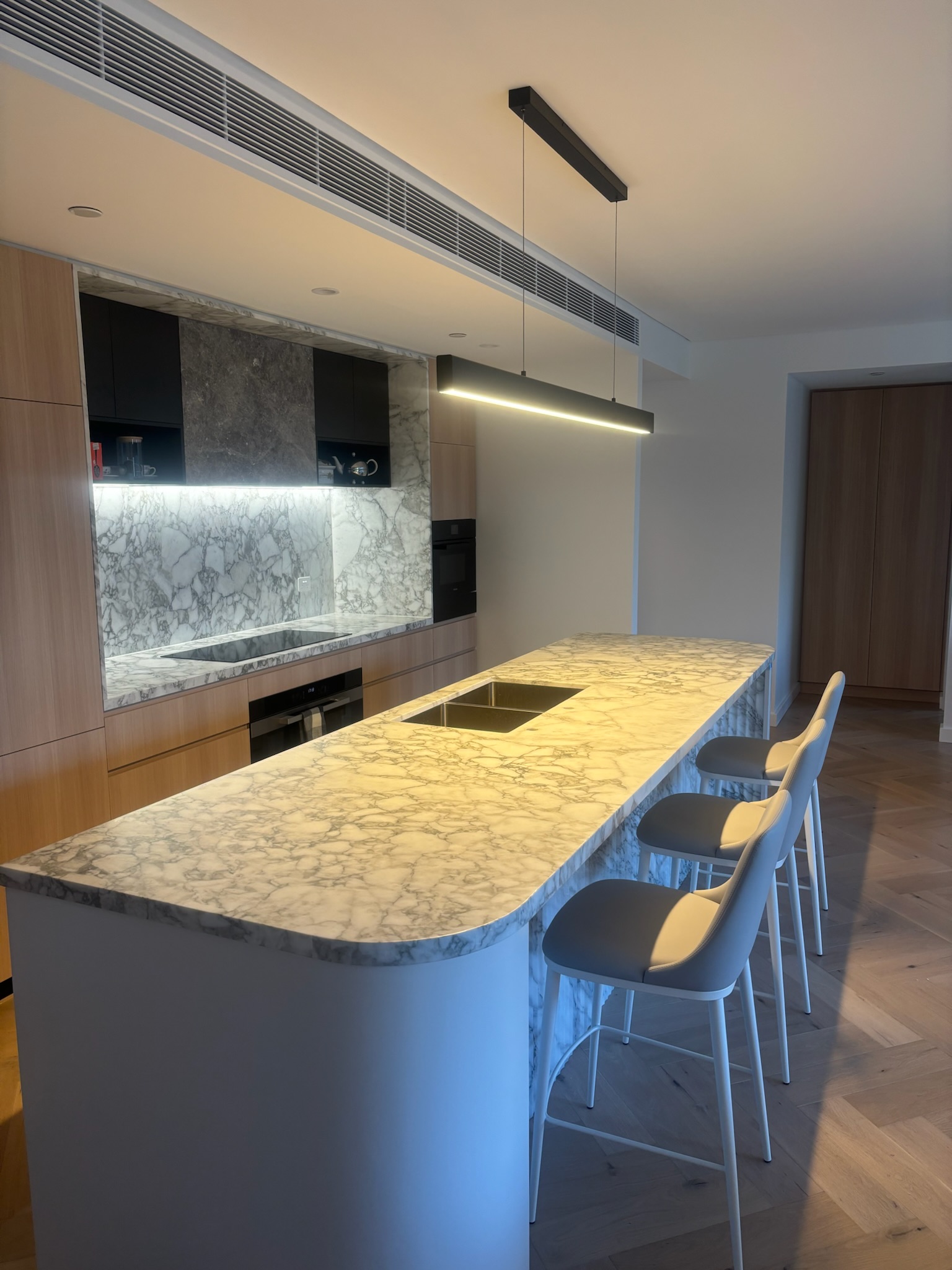 Refined natural-stone kitchen in Greater Sydney